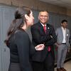 Dean Madhavan with students in hallway