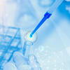 An image of liquid being put into a beaker