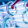 beakers with red liquid